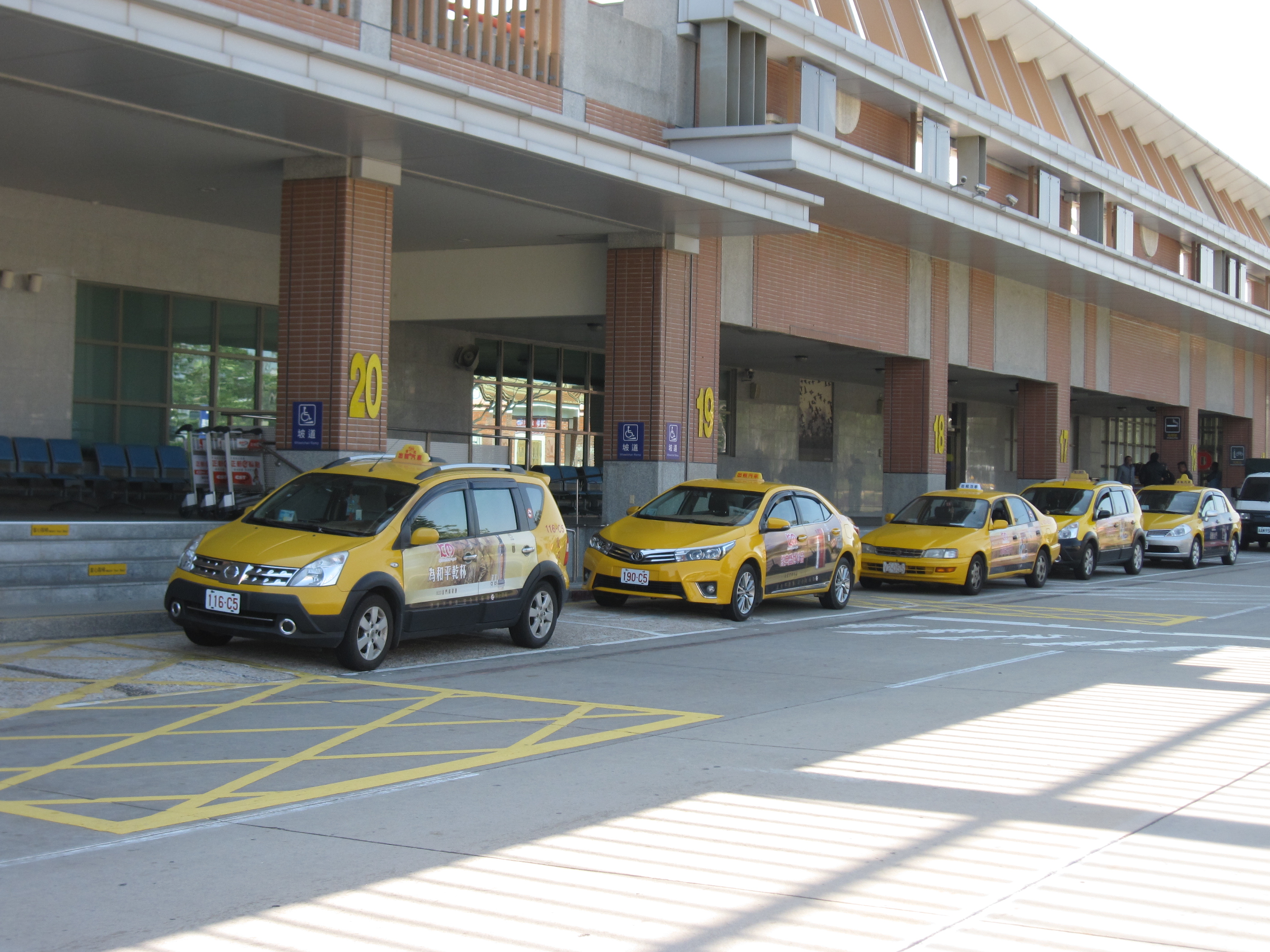 Taxi Station of Pillar No.20 in front of the Departure Gate of the Airport