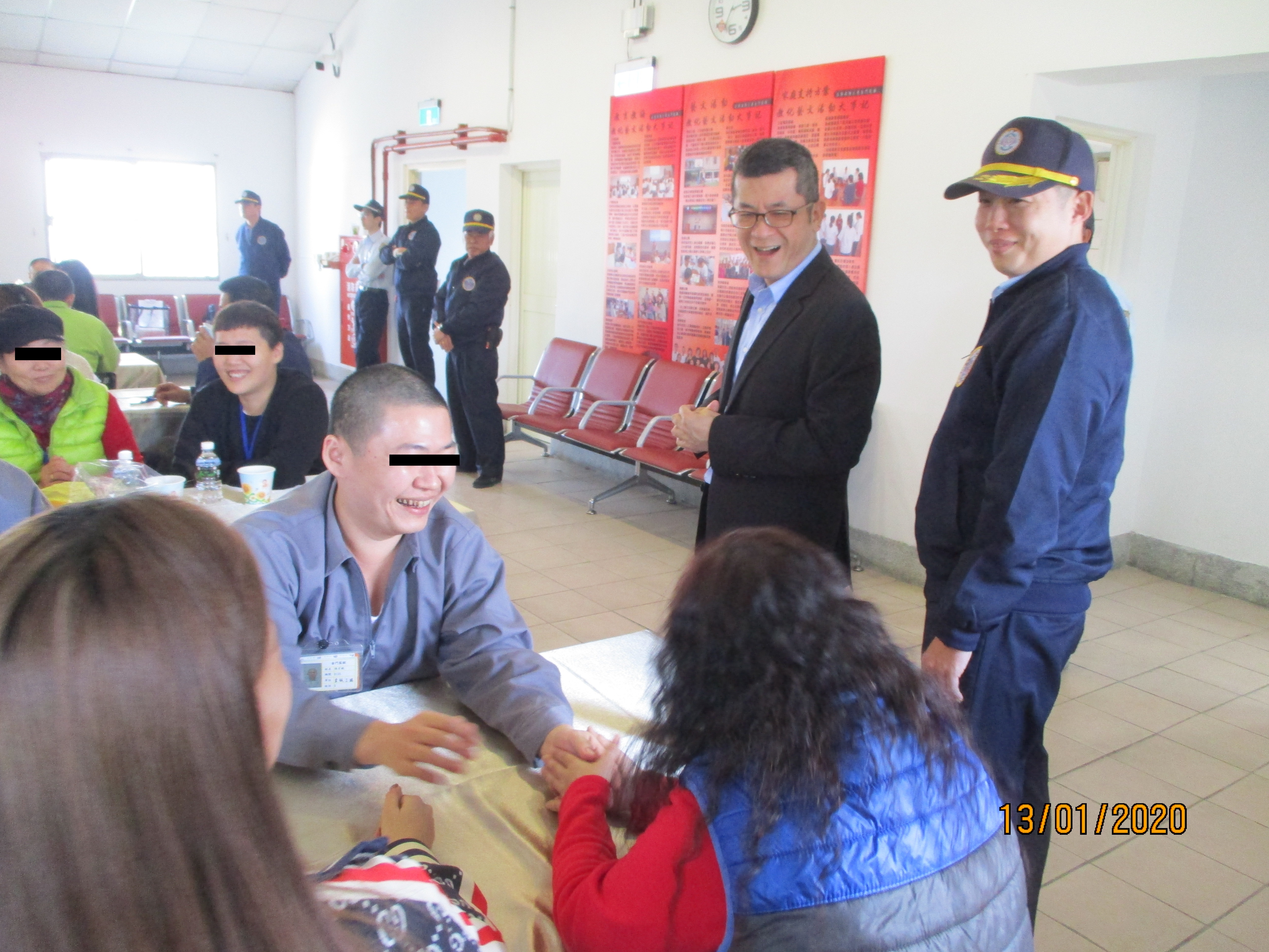 Inmates and Families Greeting Each Other