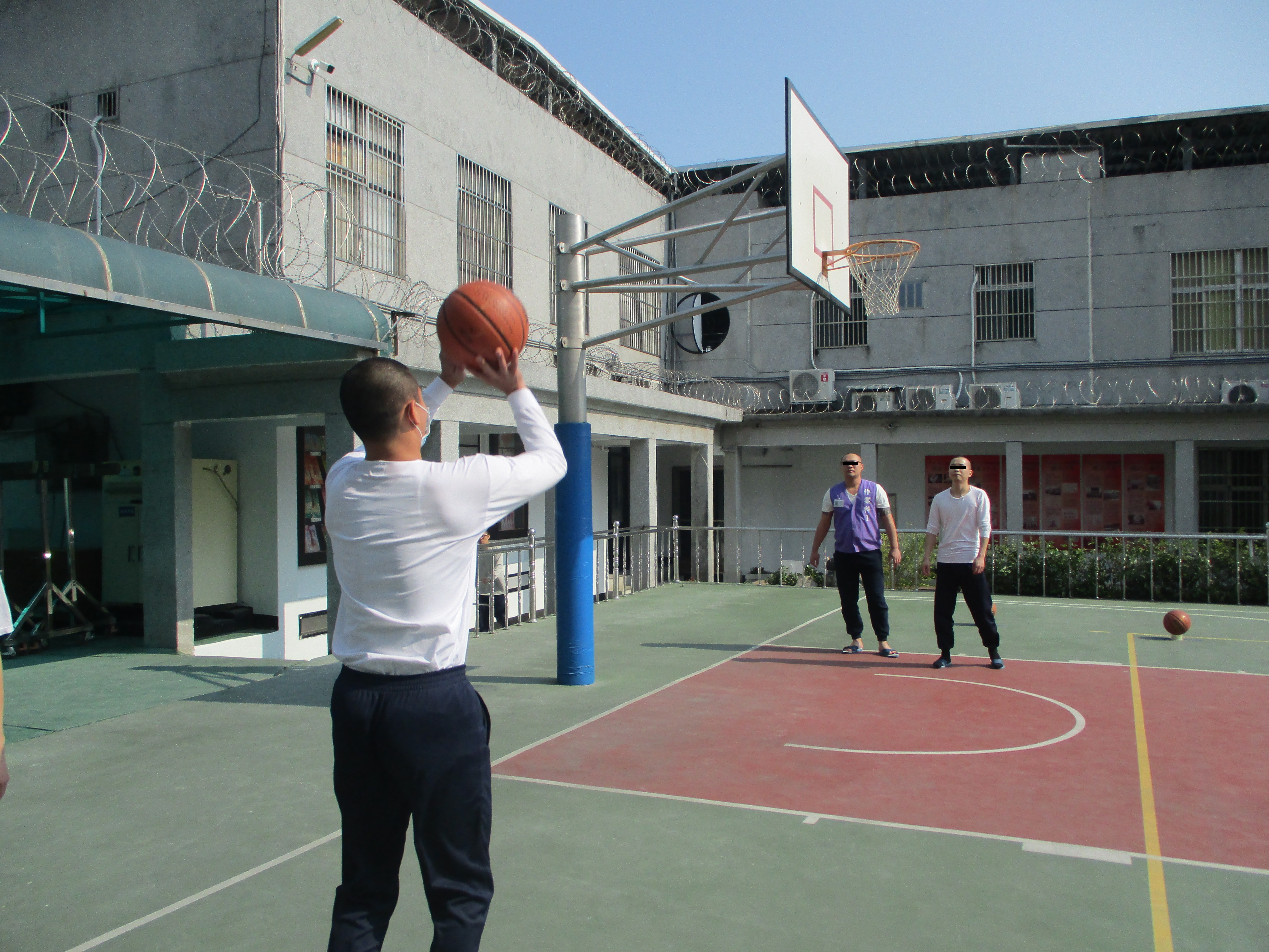 Inmate Ready to Shot a Basket