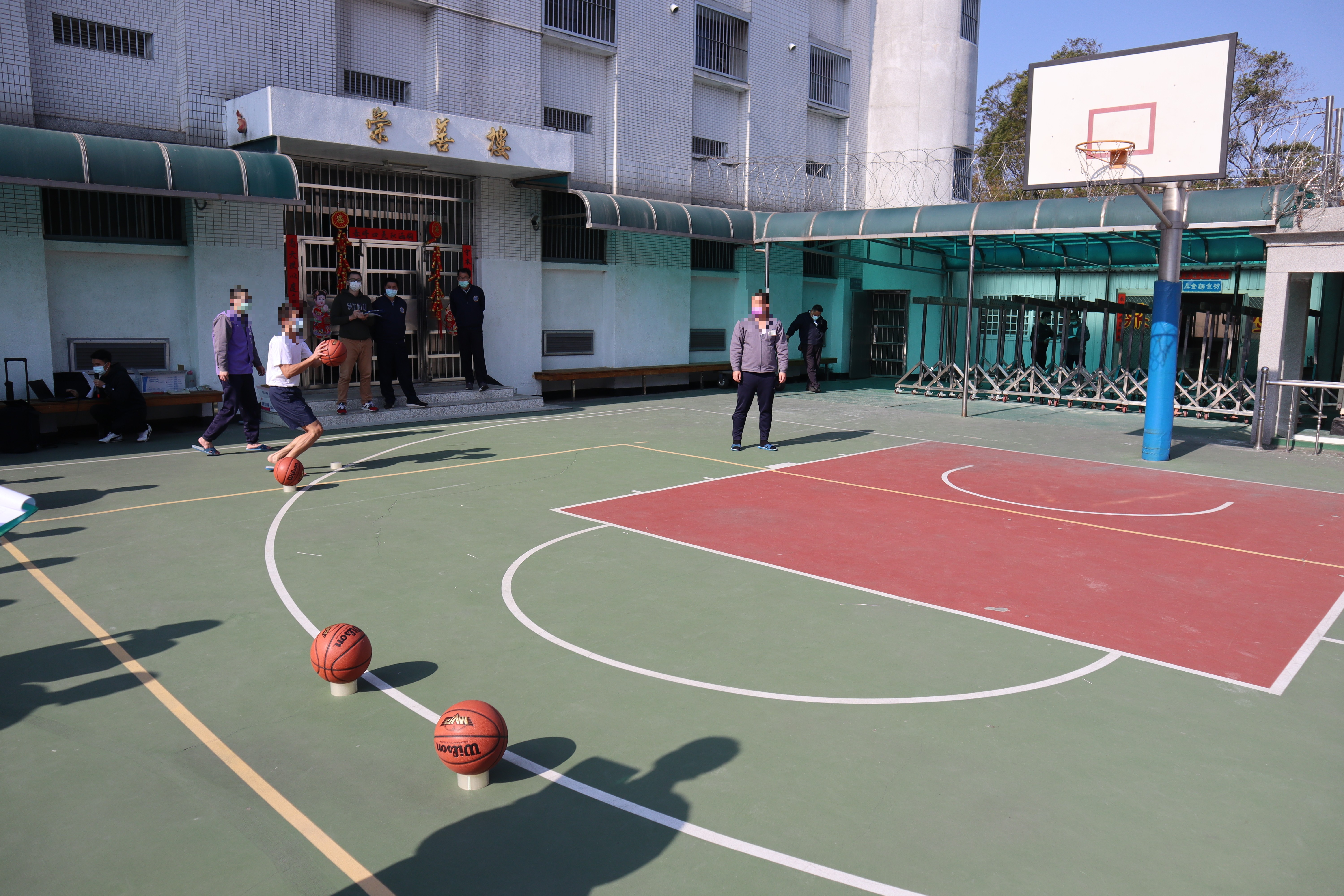 Container aims at the basket and prepares to shoot