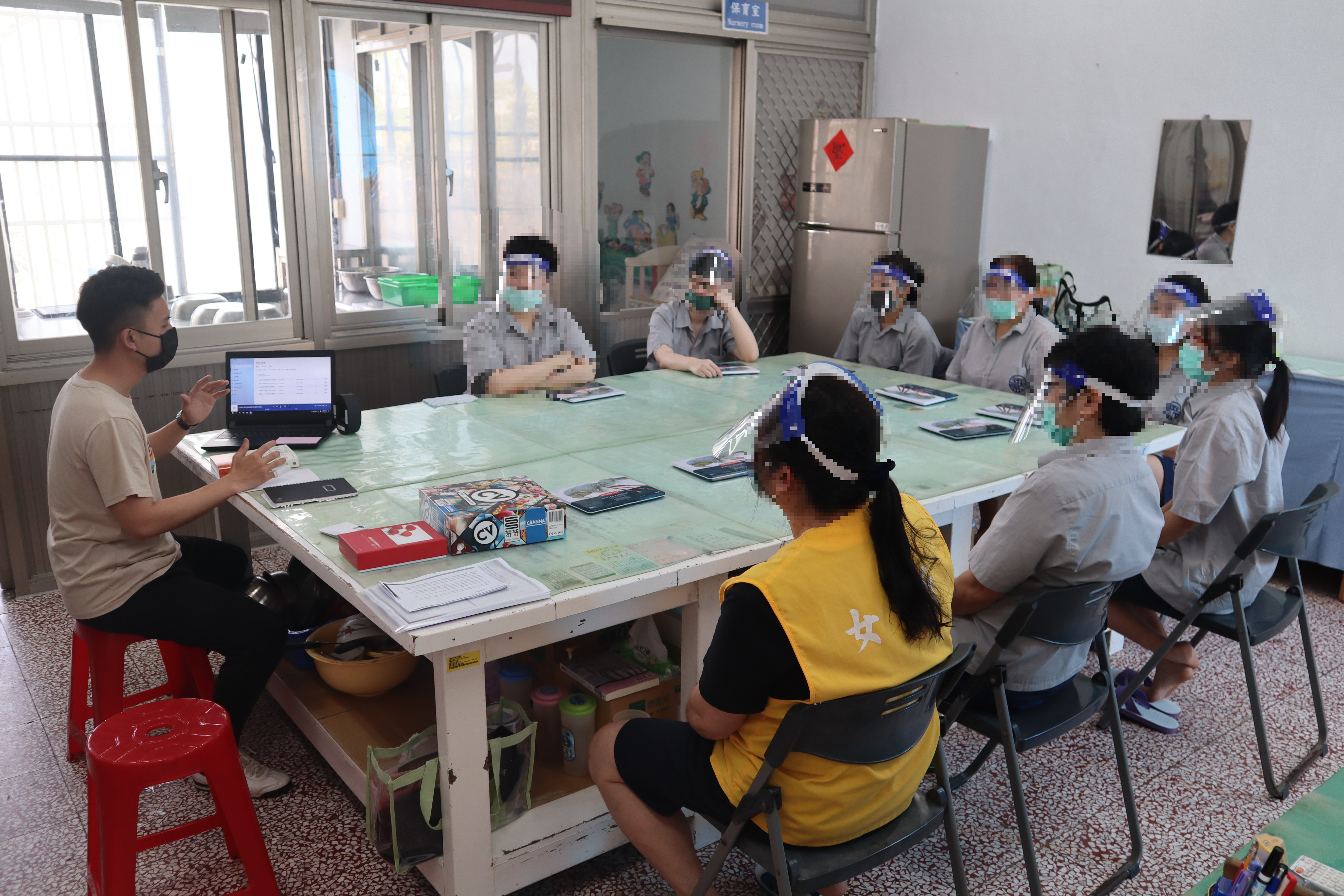 The psychological counselor tells the inmates the theme of this sharing