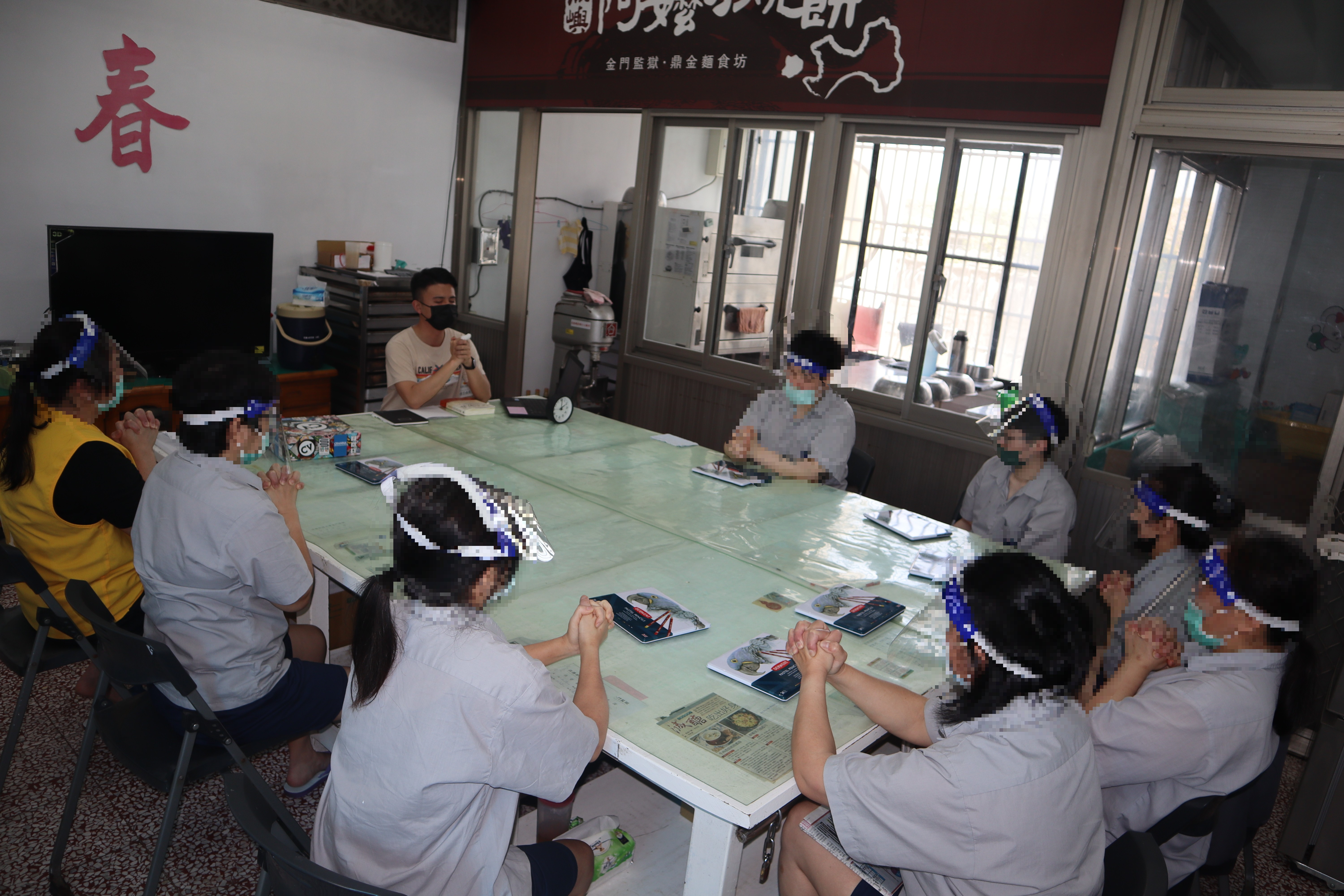 Counselor invites inmates to practice progressive muscle relaxation exercis