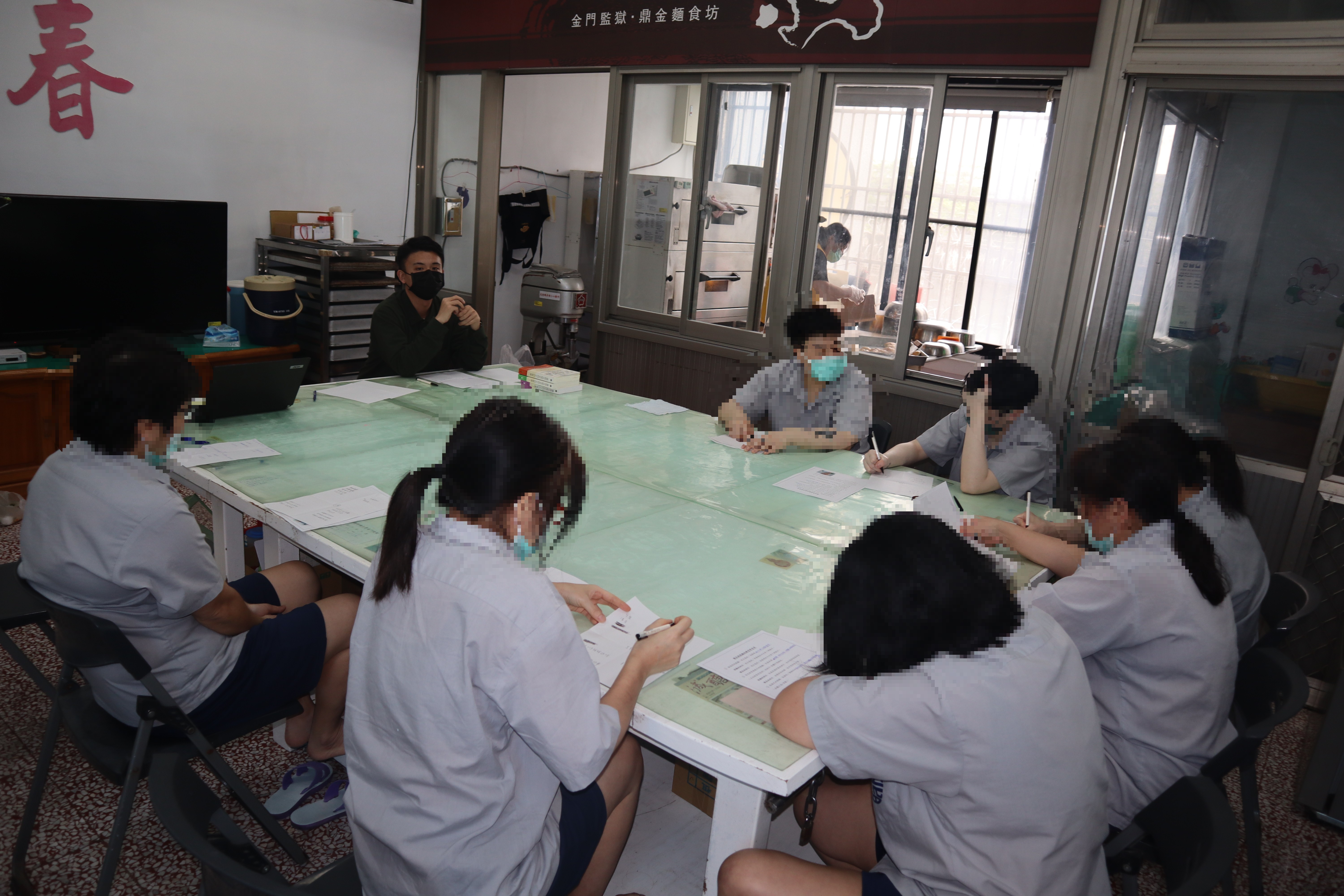 Psychological counselors interact with inmates
