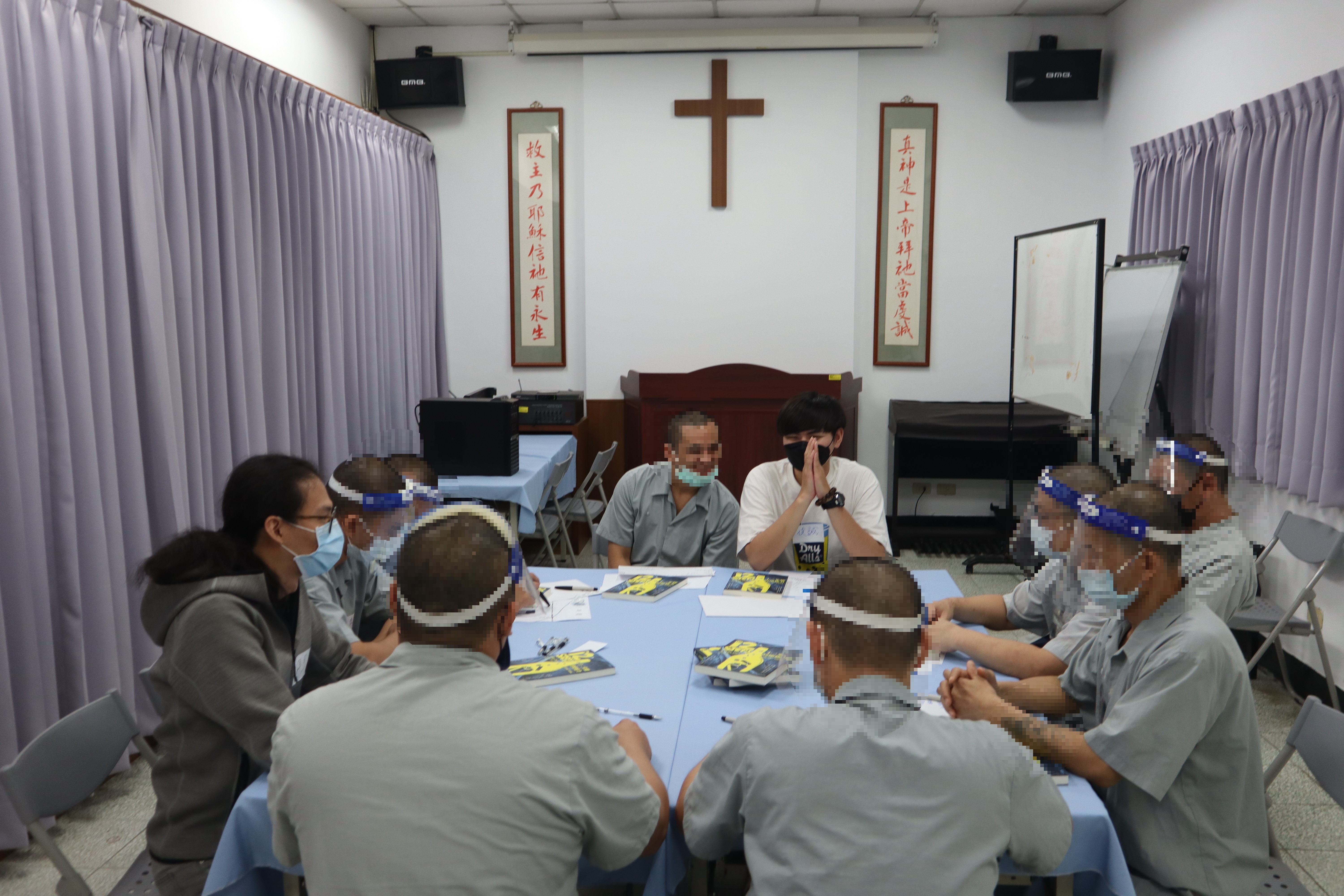 Psychologists interact with inmates